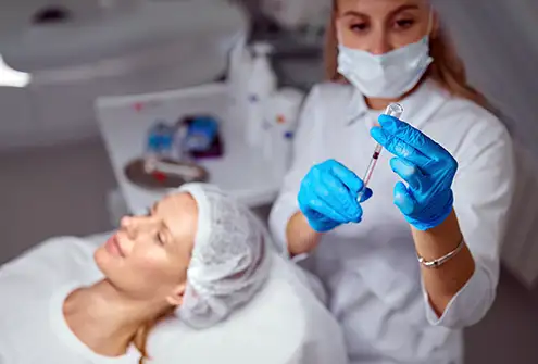 Therapist giving a Dermal Fillers Treatment